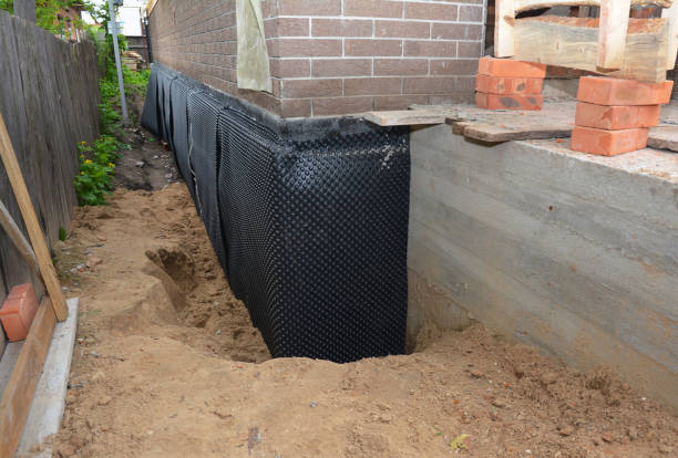 SJ Waterproofing Pros technician performing targeted Waterproofing assessment in Great Falls, SC